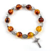 H30ce113cf8324ac29efe1b5a9dbf2bd9G Komi Wholesale Metal Cross Imitate Amber Beads Crucifix Pendant Prayer Rosary Bracelet