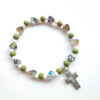 KOMI Hot Selling Multicolor Ceramic Hollow Cross Religious Mary Jesus Virgin Elastic Beading Bracelet