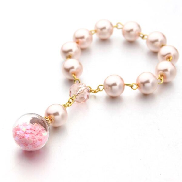 H2b3234003f5e48a0a76b09b34e23a6f2I Komi Wholesales Pink Glass Pearl Glass Star Sphere Religious Baby Baptism Rosary Bracelets