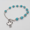H32229101fe874c3c9b1c68feeb19f1d0e Komi Wholesales Religious Turquoise Beads Peace Dove Cross Pendant Rosary Bracelet