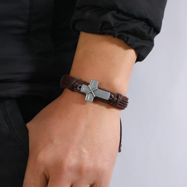 H508ac6c7015f4d4b8142a93ea99f318fz KOMI New Cowhide Bracelet Simple Pull Adjustable Cross Bracelet Rope