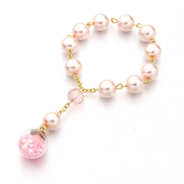H84b0a6ca3c8b4a7a855880ff8f9ae845j Komi Wholesales Pink Glass Pearl Glass Star Sphere Religious Baby Baptism Rosary Bracelets