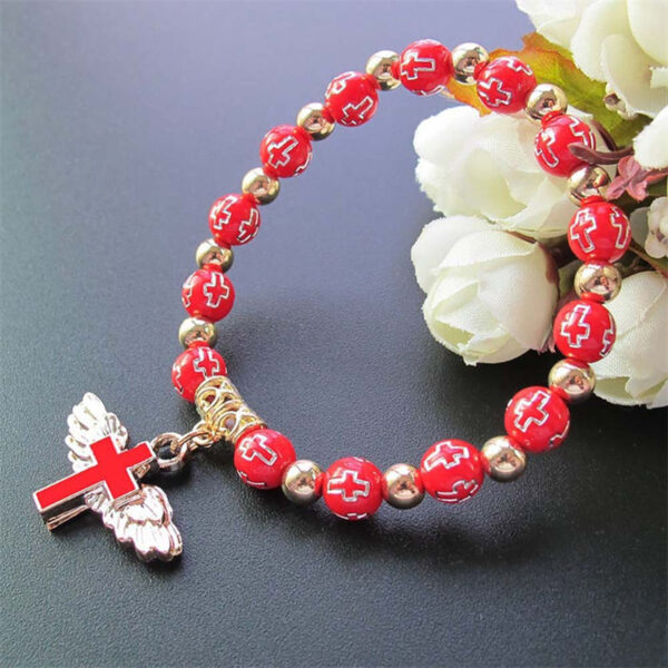H9e345d55086b4401bd2a7be767830bffx KOMI Hot Sale Gilding Acrylic Cross Beaded Bracelets Enamel Angel Wing Cross Pendant Rosary Bracelet for Women Birthday Gifts