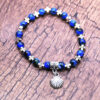 Hot Selling Blue Glass Shell Jesus Cross Crucifix Bracelet Jewelry Beaded Bracelet