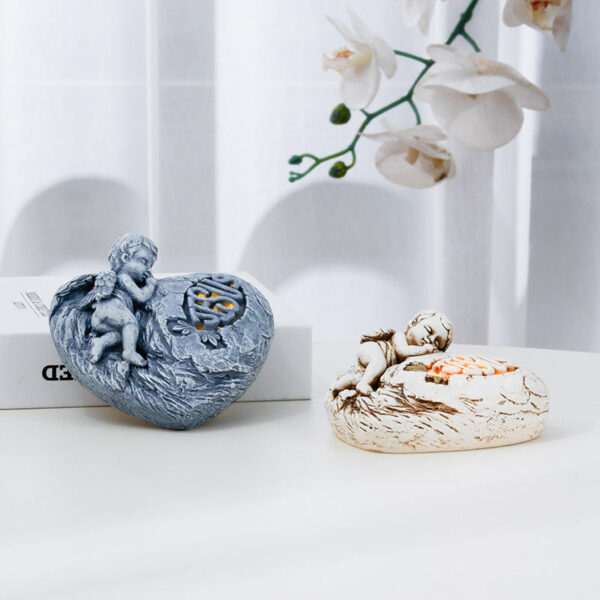 Hef50c0c55a904d9eb815da5d54ea0cdaD KOMI Best Selling Home Garden Statues Resin Little Angel Cross Heart Statues for Table Pillar Standing OrnamentsCrafts Gifts