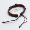 Hefc8dc2446e745bbb1129052bd1d8d090 KOMI New Cowhide Bracelet Simple Pull Adjustable Cross Bracelet Rope