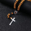 af303f05eb16d785c4305d88f48798b2_Hfdb773fae0154045ac201edb8aa3f813a_avif=close&webp=close Komi Catholic Brown Wooden Rosary Virgin Mary with Soil Medal Jesus Cross Braided Rope with Clasp Necklace Religious Jewelry