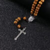 cc1c619a6519430b9166b3f487bf4cd5_H99ca15370a7c4acd802e6d8f16286f9c8_avif=close&webp=close Komi Catholic Brown Wooden Rosary Virgin Mary with Soil Medal Jesus Cross Braided Rope with Clasp Necklace Religious Jewelry